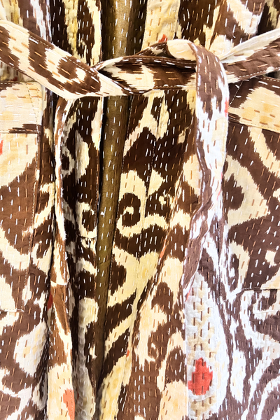 BROWN WITH WHITE PAISLEY AND RED LEAF MOTIF
